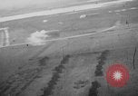 Image of strafing parked truck and stationary vehicles European Theater, 1944, second 7 stock footage video 65675047712