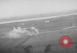 Image of strafing parked truck and stationary vehicles European Theater, 1944, second 8 stock footage video 65675047712