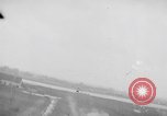 Image of strafing parked truck and stationary vehicles European Theater, 1944, second 10 stock footage video 65675047712