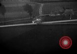 Image of strafing parked truck and stationary vehicles European Theater, 1944, second 12 stock footage video 65675047712