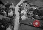 Image of strafing parked truck and stationary vehicles European Theater, 1944, second 22 stock footage video 65675047712