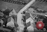 Image of strafing parked truck and stationary vehicles European Theater, 1944, second 23 stock footage video 65675047712