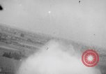 Image of strafing parked truck and stationary vehicles European Theater, 1944, second 25 stock footage video 65675047712
