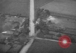 Image of strafing parked truck and stationary vehicles European Theater, 1944, second 27 stock footage video 65675047712