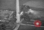 Image of strafing parked truck and stationary vehicles European Theater, 1944, second 28 stock footage video 65675047712