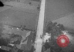 Image of strafing parked truck and stationary vehicles European Theater, 1944, second 29 stock footage video 65675047712