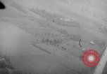 Image of strafing parked truck and stationary vehicles European Theater, 1944, second 30 stock footage video 65675047712