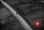 Image of strafing parked truck and stationary vehicles European Theater, 1944, second 34 stock footage video 65675047712