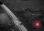 Image of strafing parked truck and stationary vehicles European Theater, 1944, second 35 stock footage video 65675047712