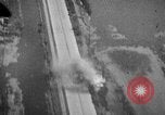Image of strafing parked truck and stationary vehicles European Theater, 1944, second 41 stock footage video 65675047712