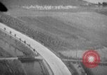 Image of strafing parked truck and stationary vehicles European Theater, 1944, second 42 stock footage video 65675047712