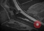 Image of strafing parked truck and stationary vehicles European Theater, 1944, second 44 stock footage video 65675047712