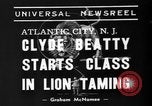 Image of animal tamer Clyde Beatty Atlantic City New Jersey USA, 1939, second 3 stock footage video 65675047782