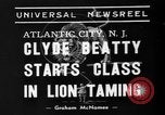 Image of animal tamer Clyde Beatty Atlantic City New Jersey USA, 1939, second 4 stock footage video 65675047782