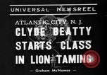 Image of animal tamer Clyde Beatty Atlantic City New Jersey USA, 1939, second 7 stock footage video 65675047782