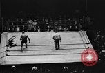 Standbild Ringkampf Buffalo New York USA, 1938, aus Sekunde 25 historischem Filmmaterial Videoclip 65675047792