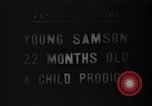 Image of boy on sandy beach United States USA, 1936, second 9 stock footage video 65675047809