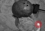 Image of boy on sandy beach United States USA, 1936, second 16 stock footage video 65675047809