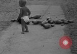 Image of boy on sandy beach United States USA, 1936, second 22 stock footage video 65675047809