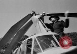 Image of autogyro lands in town United States USA, 1936, second 30 stock footage video 65675047810