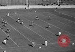 Image of football match United States USA, 1936, second 14 stock footage video 65675047811
