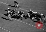 Image of football match United States USA, 1936, second 34 stock footage video 65675047811