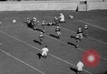 Image of football match United States USA, 1936, second 54 stock footage video 65675047811