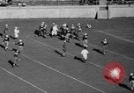 Image of football match United States USA, 1936, second 56 stock footage video 65675047811