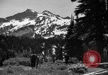 Image glissading Washington Mount Rainier National Park USA, 1938, de la seconde 7 séquences d'archives historiques vidéo 65675047826