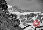 Image glissading Washington Mount Rainier National Park USA, 1938, de la seconde 14 séquences d'archives historiques vidéo 65675047826