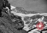 Image glissading Washington Mount Rainier National Park USA, 1938, de la seconde 16 séquences d'archives historiques vidéo 65675047826