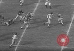 Immagine di Football americano Los Angeles California USA, 1952, secondo 13 filmato di repertorio 65675047834