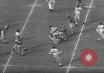 Immagine di Football americano Los Angeles California USA, 1952, secondo 14 filmato di repertorio 65675047834