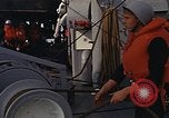 Standbild United States Marines hinabsteigen Gepäcknetzen Okinawa Japan, 1961, aus Sekunde 12 historischem Filmmaterial Videoclip 65675047857