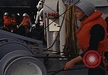 Standbild United States Marines hinabsteigen Gepäcknetzen Okinawa Japan, 1961, aus Sekunde 14 historischem Filmmaterial Videoclip 65675047857
