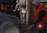 Standbild United States Marines hinabsteigen Gepäcknetzen Okinawa Japan, 1961, aus Sekunde 16 historischem Filmmaterial Videoclip 65675047857