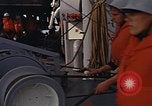 Standbild United States Marines hinabsteigen Gepäcknetzen Okinawa Japan, 1961, aus Sekunde 17 historischem Filmmaterial Videoclip 65675047857