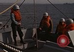 Standbild United States Marines hinabsteigen Gepäcknetzen Okinawa Japan, 1961, aus Sekunde 20 historischem Filmmaterial Videoclip 65675047857