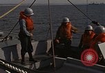 Standbild United States Marines hinabsteigen Gepäcknetzen Okinawa Japan, 1961, aus Sekunde 23 historischem Filmmaterial Videoclip 65675047857