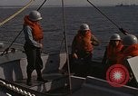 Standbild United States Marines hinabsteigen Gepäcknetzen Okinawa Japan, 1961, aus Sekunde 24 historischem Filmmaterial Videoclip 65675047857
