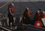 Standbild United States Marines hinabsteigen Gepäcknetzen Okinawa Japan, 1961, aus Sekunde 25 historischem Filmmaterial Videoclip 65675047857