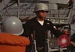 Standbild United States Marines hinabsteigen Gepäcknetzen Okinawa Japan, 1961, aus Sekunde 26 historischem Filmmaterial Videoclip 65675047857