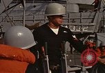 Standbild United States Marines hinabsteigen Gepäcknetzen Okinawa Japan, 1961, aus Sekunde 27 historischem Filmmaterial Videoclip 65675047857