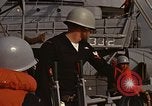 Standbild United States Marines hinabsteigen Gepäcknetzen Okinawa Japan, 1961, aus Sekunde 29 historischem Filmmaterial Videoclip 65675047857