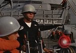 Standbild United States Marines hinabsteigen Gepäcknetzen Okinawa Japan, 1961, aus Sekunde 30 historischem Filmmaterial Videoclip 65675047857