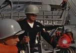 Standbild United States Marines hinabsteigen Gepäcknetzen Okinawa Japan, 1961, aus Sekunde 31 historischem Filmmaterial Videoclip 65675047857