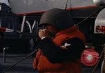 Standbild United States Marines hinabsteigen Gepäcknetzen Okinawa Japan, 1961, aus Sekunde 38 historischem Filmmaterial Videoclip 65675047857