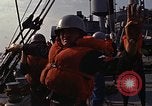 Standbild United States Marines hinabsteigen Gepäcknetzen Okinawa Japan, 1961, aus Sekunde 44 historischem Filmmaterial Videoclip 65675047857