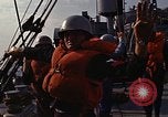 Standbild United States Marines hinabsteigen Gepäcknetzen Okinawa Japan, 1961, aus Sekunde 45 historischem Filmmaterial Videoclip 65675047857