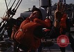 Standbild United States Marines hinabsteigen Gepäcknetzen Okinawa Japan, 1961, aus Sekunde 48 historischem Filmmaterial Videoclip 65675047857